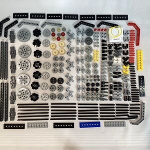 Lego Technic Parts Assortment in Black, Gray, Yellow, Red, Blue
